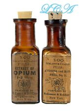 2 ORIGINAL antique McKesson Robbins OPUIM & MORPHINE bottles EMBOSSED w/ LABELS picture