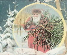 Old World Santa Claus 1900s Bag Full of Toys in woods Carrying a Christmas Tree picture