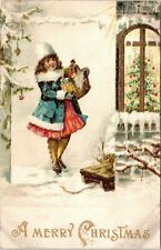 C.1910s Merry Christmas Adorable Girl Child W Toy Basket Postcard  A117 picture