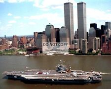 USS JOHN F. KENNEDY WITH WORLD TRADE CENTER IN BACKGROUND - 8X10 PHOTO (ZZ-606) picture