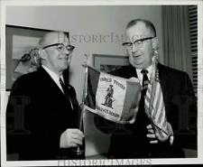 1963 Press Photo Boeing treasurer Evan Nelsen receives flags from William Neal picture