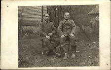 WWI German soldiers uniform sitting outside ~date on back 1918 ~ RPPC real photo picture