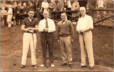 Real Photo Postcard Four People Holding Golf Clubs Golf Course Spectators picture