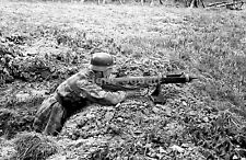 WW2 Picture Photo France 1944 German soldier testing a British PIAT 2447 picture
