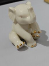 Lenox Baby Elephant Porcelain Figurine 24k Gold trim sitting w/raised trunk picture