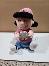 Gemmy Peanuts Lucy with Light Up Snowflake Plush - Jingle Bells picture