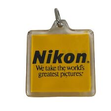 Vintage Nikon Camera Keychain Square Yellow Worlds Greatest Pictures fob plastic picture