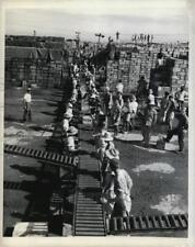 1945 Press Photo Workers assist in unloading supplies in Manila, WWII picture
