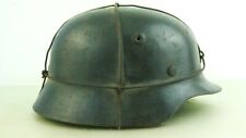 WW2 GERMAN M-40 HELMET WITH CROSS WIRE FOR CAMO PURPOSES,SIZE 66 , NAMED, COMPL. picture