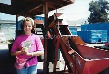 FOUND PHOTO Color A YOUNG GIRL WITH HER RECYCLING MONEY Snapshot  21 47 Z picture