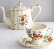 European Vintage Tea Delight: Elegant Teapot and Cup for Perfect Tea picture