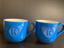Keurig embossed logo coffee cup pair. signature  blue ceramic picture