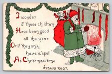 c1910 Postcard Green  Santa Claus In Front Fireplace Toy Sack Stockings P32 picture