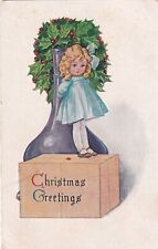Christmas Greetings Girl On Box Holly Purple Vase Postcard B33 picture