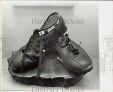 1980 Press Photo Coach Howard Schnellenberger's football shoes, mounted picture