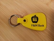 Vintage  Yellow F and M Bank Keychain  picture