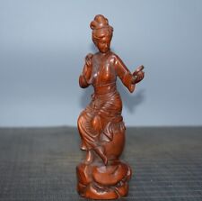 Old Tibetan boxwood looks at beautiful women in the mirror picture