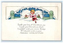 1922 Merry Christmas Seal Girl Bed With Dolls Winter Snowfall Vintage Postcard picture