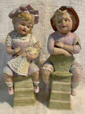 2 Vintage FIGURINES Gebruder Heubach Schutz Marke Bisque Germany Girl/doll 1900s picture