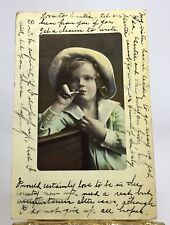 1909 IMAGE OF SMOKING YOUNG ART DECO GIRL WITH Curls & HAT RPPC HAND. COLOR P172 picture