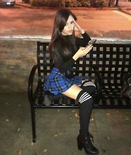 JENNY ORTEGA - SITTING WITH LIKE A CATHOLIC SCHOOL GIRL OUTFIT  picture