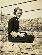 XG Photograph Portrait Pretty Woman Sitting On Stone Wall Short Hair 1940's picture
