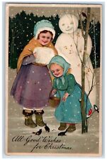 c1910's Christmas Snowman Girl Handwarmer Feed Birds Embossed Posted Postcard picture