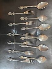 Set of melchiour Soviet era spoons and forks picture