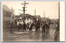 Postcard Marching Band Parade Residential Street Brass Instruments RPPC T111 picture