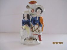 Antique English Staffordshire Spill Vase Young Boy & Girl in Regional Costume picture