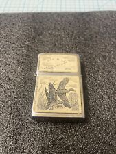 USED Zippo lighter SCRIMSHAW 2004 Flying Ducks.  NICE/RARE. Read Please- A STEEL picture
