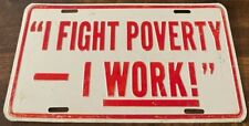 I Fight Poverty I Work Novelty Booster License Plate picture
