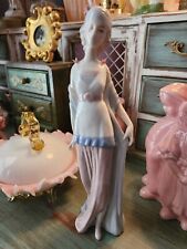 Porcelain Beautiful Woman Figure With 3D Flower Accents picture
