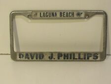 Laguna Beach David J Phillips Dealership License Plate Frame Embossed Metal  picture
