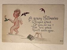 C.1910 HALLOWEEN F.A. OWEN FRIGHTENED CUPID BATS GHOST STORIES BOOK Postcard picture