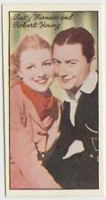 Robert Young + Betty Furness 1935 Carreras Famous Film Stars Tobacco Card #73 picture