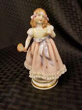 Vitage Figurine - Victorian girl with tennis raquet and ball picture