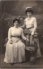 Real Photo Postcard Two Well Dressed Women in a Photo Studio picture