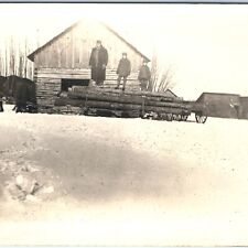 c1910s Smiling Man & Boys Pull Log Sled RPPC Logging Timber Dog Real Photo A147 picture