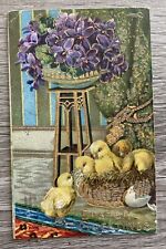 Vntg Gel Easter Postcard CHICKS Under Table Purple Flowers Gold Accents Embossed picture