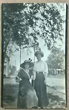 Young Women On Swing. Real Photo Postcard. RPPC. Photograph picture