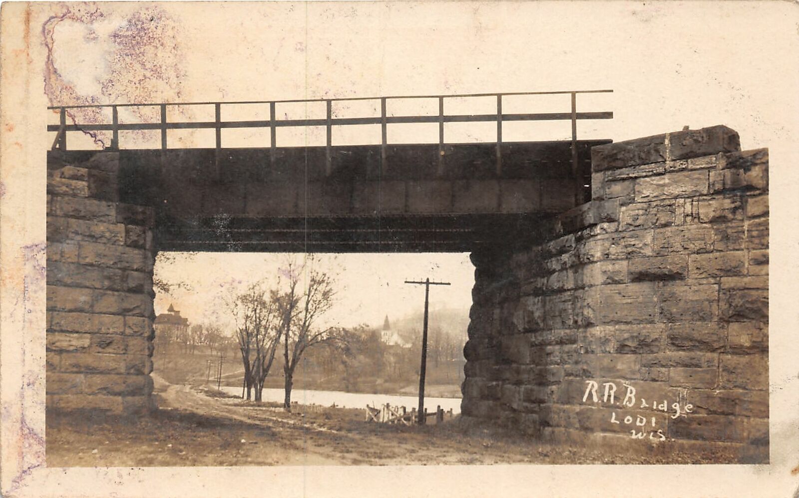 H97/ Lodi Wisconsin RPPC Postcard c1910 Railroad Bridge Stone Foundation 149