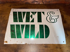 Vintage “Wet & Wild” Tin Sign picture