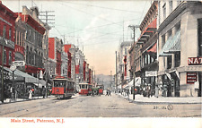 c.1905 Trolley Cars Stores Main St. Paterson NJ post card picture