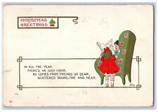 c1910s Christmas Greetings Children Reading Book Embossed Woonsocket RI Postcard picture