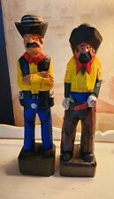 Pair Of  Hand Carved Wood Cowboy Statues That Are Handpainted picture