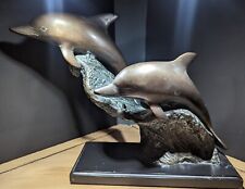 Vintage Solid Bronze Playful Swimming Dolphins Statue.  picture