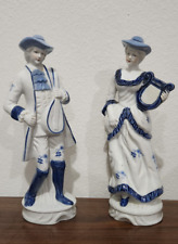 Lot Of 2 Porcelain Victorian Style Figurines Of A Gentleman & A Lady picture