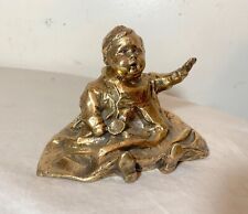antique polished signed bronze statue of a baby with spoon sculpture figure picture