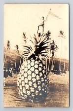 Hawaii RPPC Trick Photography, Native on Giant Pineapple Cow, c1920 Postcard picture
